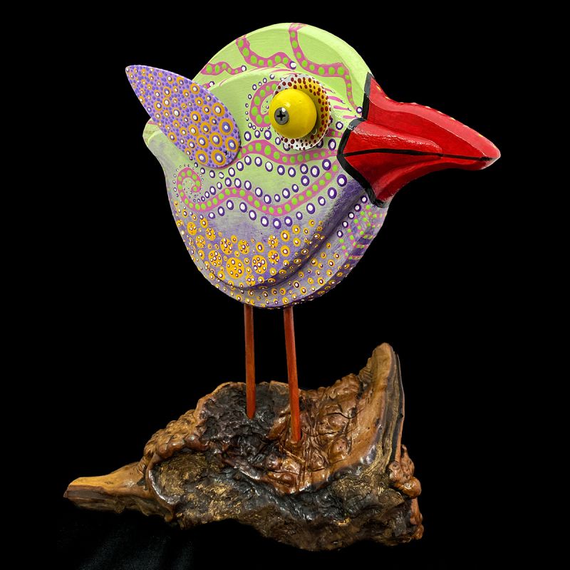 ROUND BIRD SCULPTURE ON MANZANITA